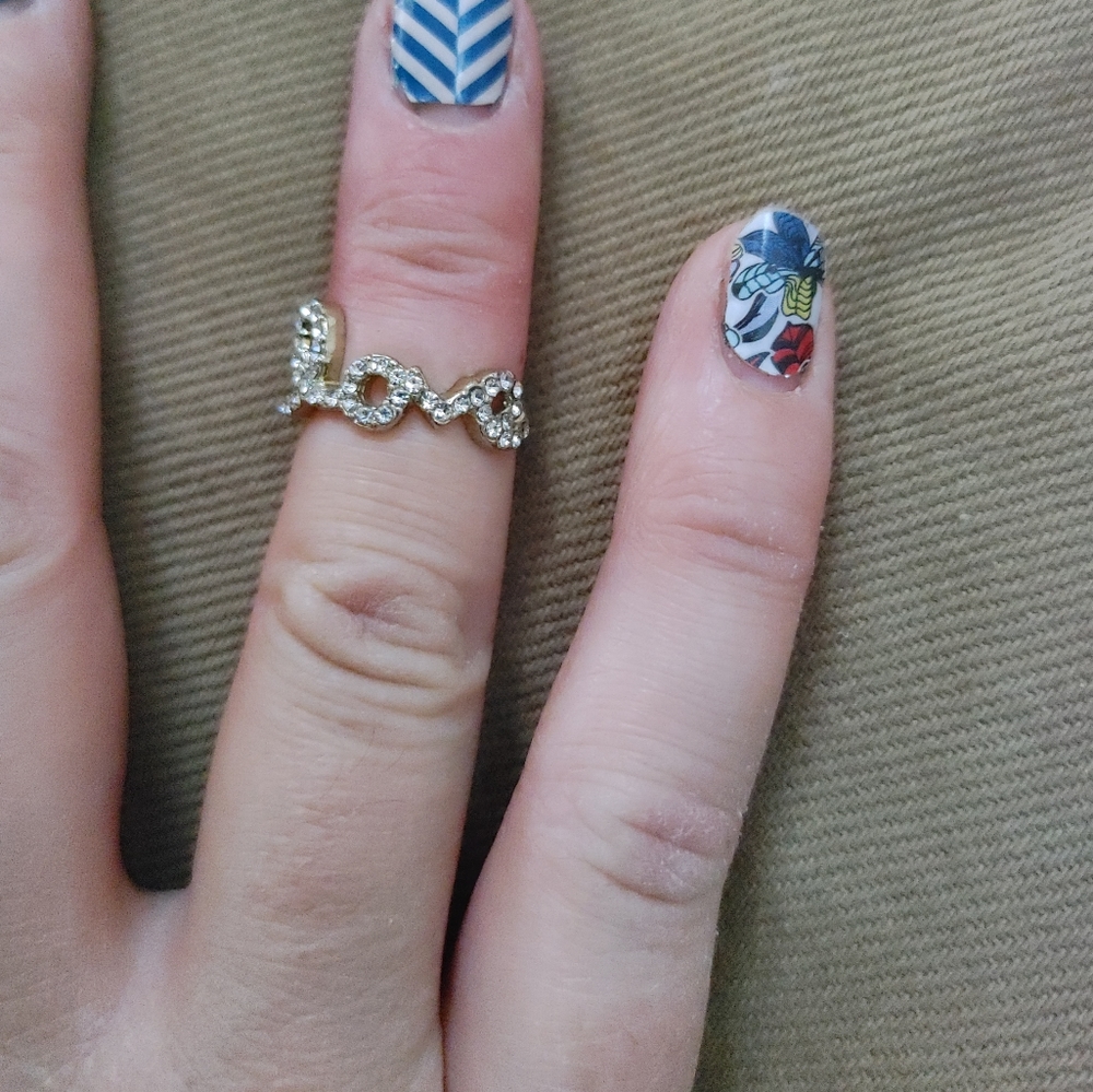 "Love" paved rhinestone on goldtone midi ring